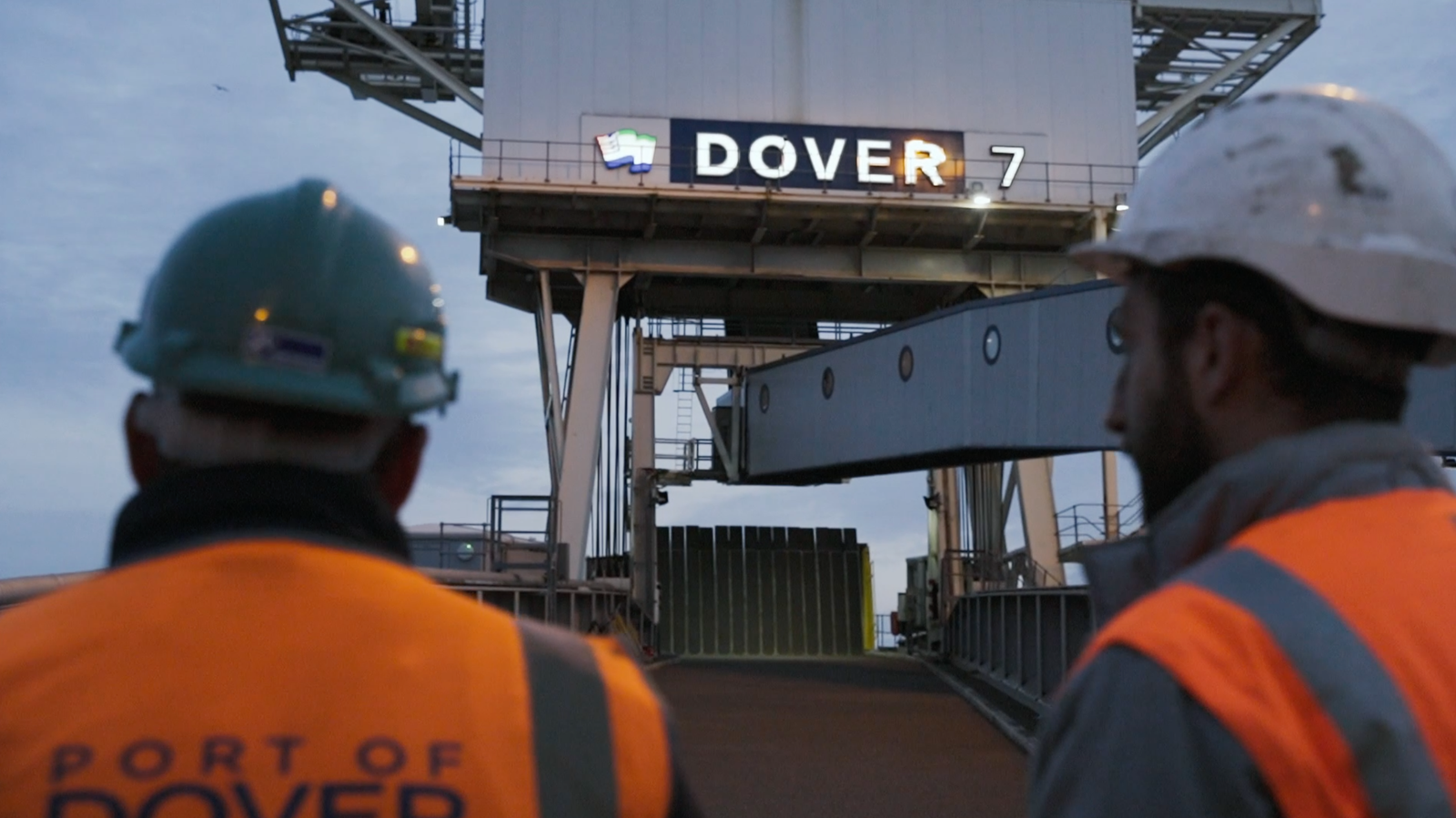 Two people walking on the Dover linkspan at dusk filmed by 93ft Sheffield for Beegrip promotional film